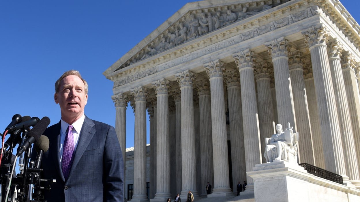 Brad Smith, President and Chief Legal Officer of Microsoft speaks during a press conference following oral arguments at the Supreme Court on US vs. Microsoft in front of the Supreme Court in Washington, DC, on February 27, 2018. Microsoft is facing off with the US government before the Supreme Court over a warrant for data stored abroad that has important ramifications for law enforcement in the age of global computing